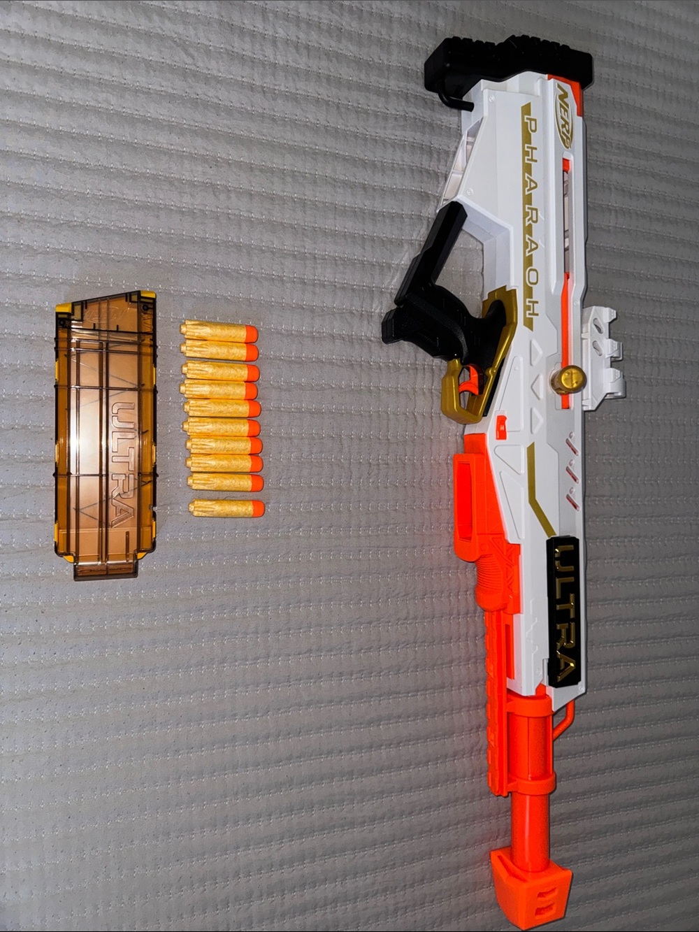 Nerf Ultra Pharaoh Blaster in White, Orange and Black with Amber Magazine